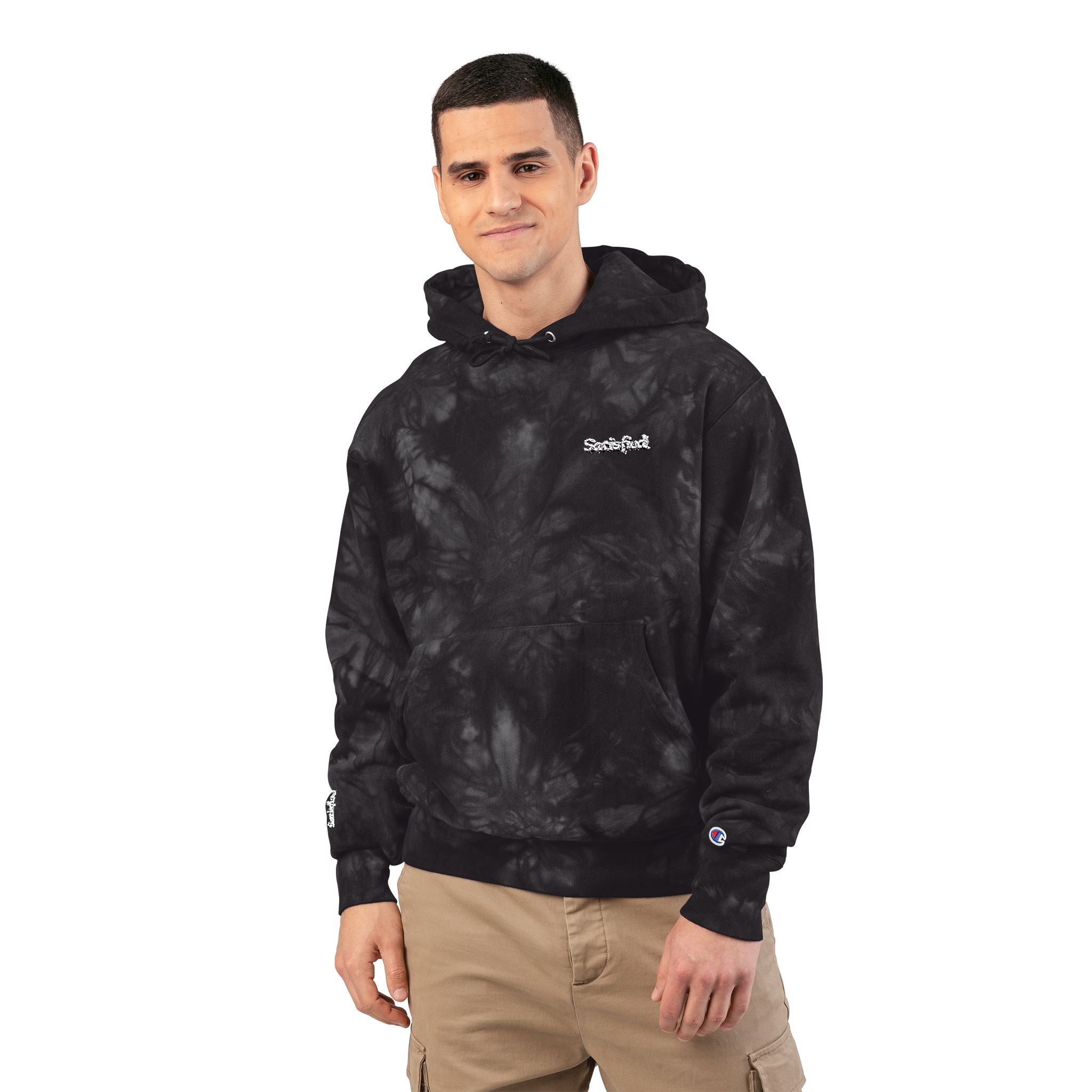 Man wearing a black tie-dye hoodie with a brand logo on a white background