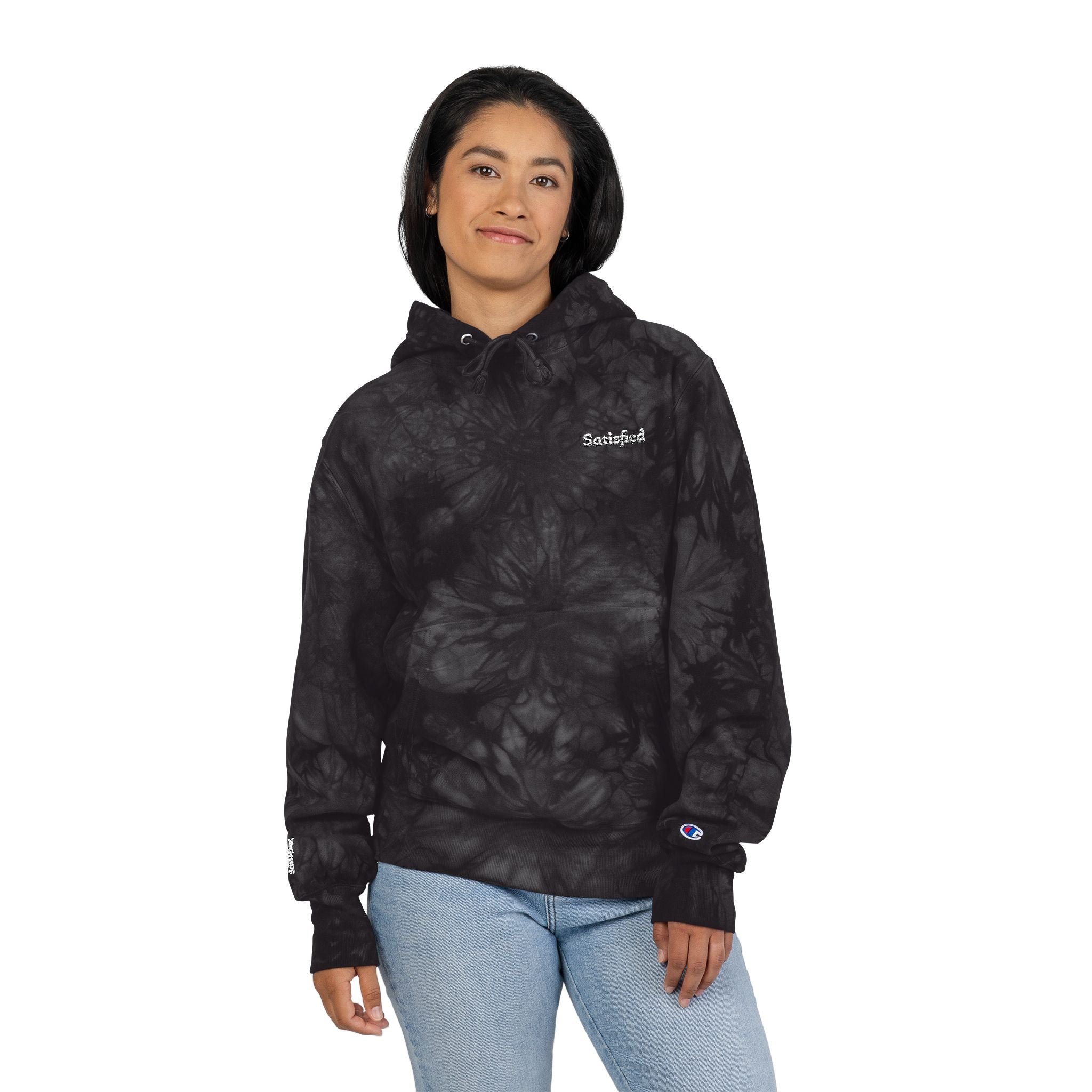 Person wearing a black hooded jacket with a brand logo on a white background